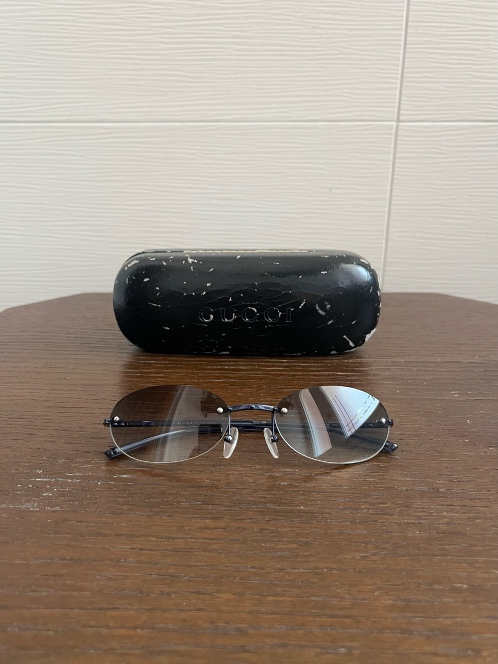 Gucci tiny Rimless Oval Sunglasses in dark blue